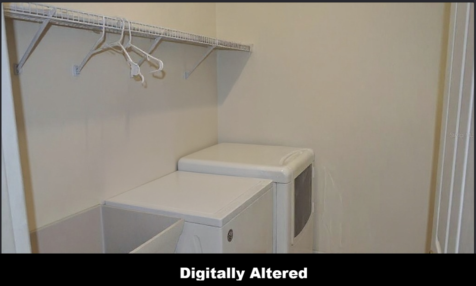 The same laundry room with the clutter removed, showing clean walls, shelf and machines